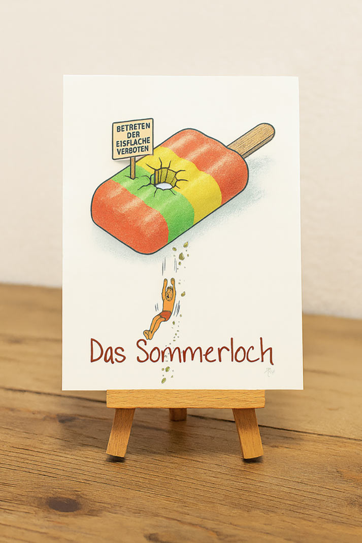 kleiner humorvoller sommerloch comic kunstdruck auf mini staffelei als tischdeko